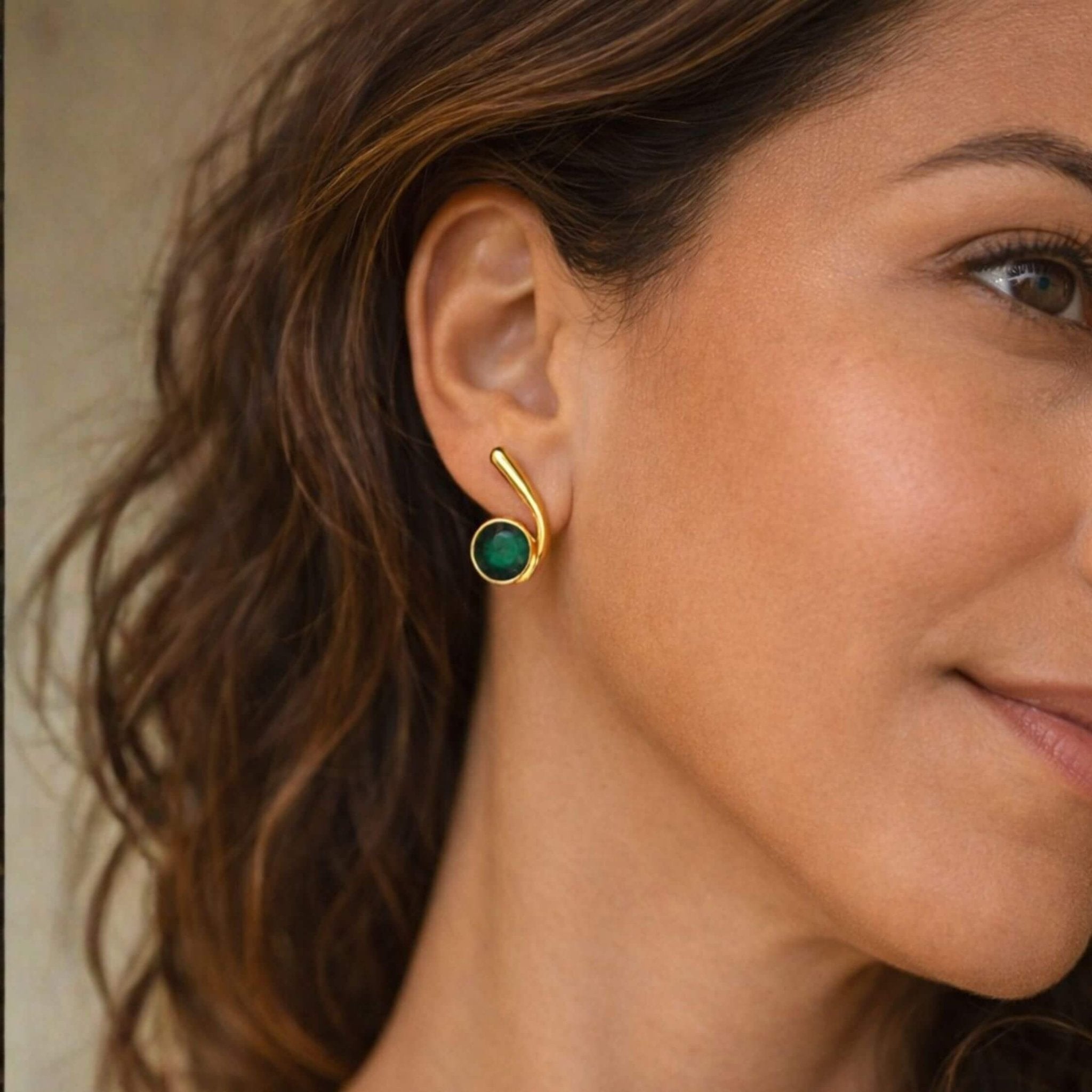 The Emerald Flow Studs