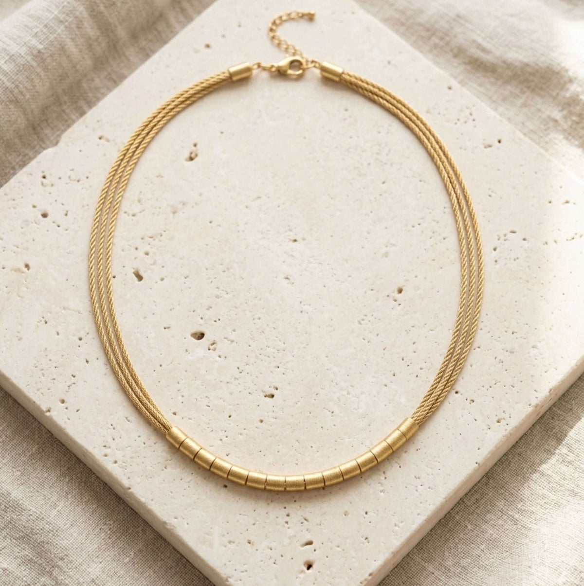 The Gilded Fiber Multi-Strand Necklace